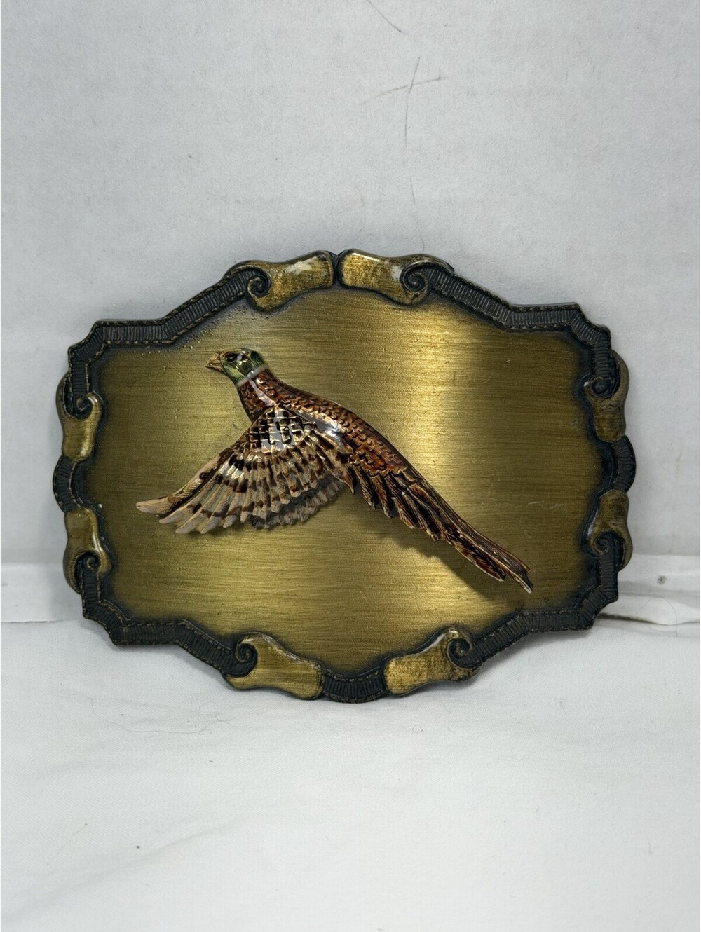 Vintage 1977 Raintree Flying Pheasant Belt Buckle Brass Tone Enamel Bird 70s